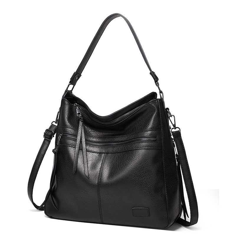 Serenas elegante Schultertasche mit Reißverschluss