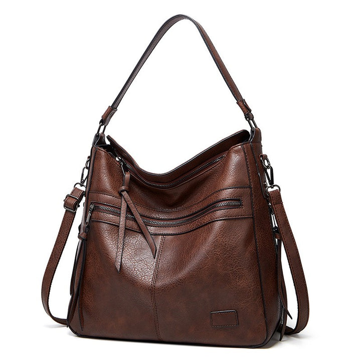 Serenas elegante Schultertasche mit Reißverschluss