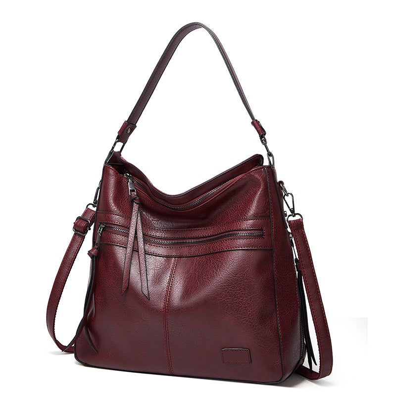 Serenas elegante Schultertasche mit Reißverschluss