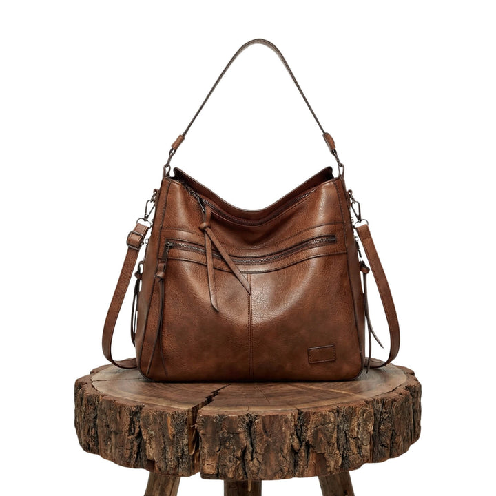 Serenas elegante Schultertasche mit Reißverschluss