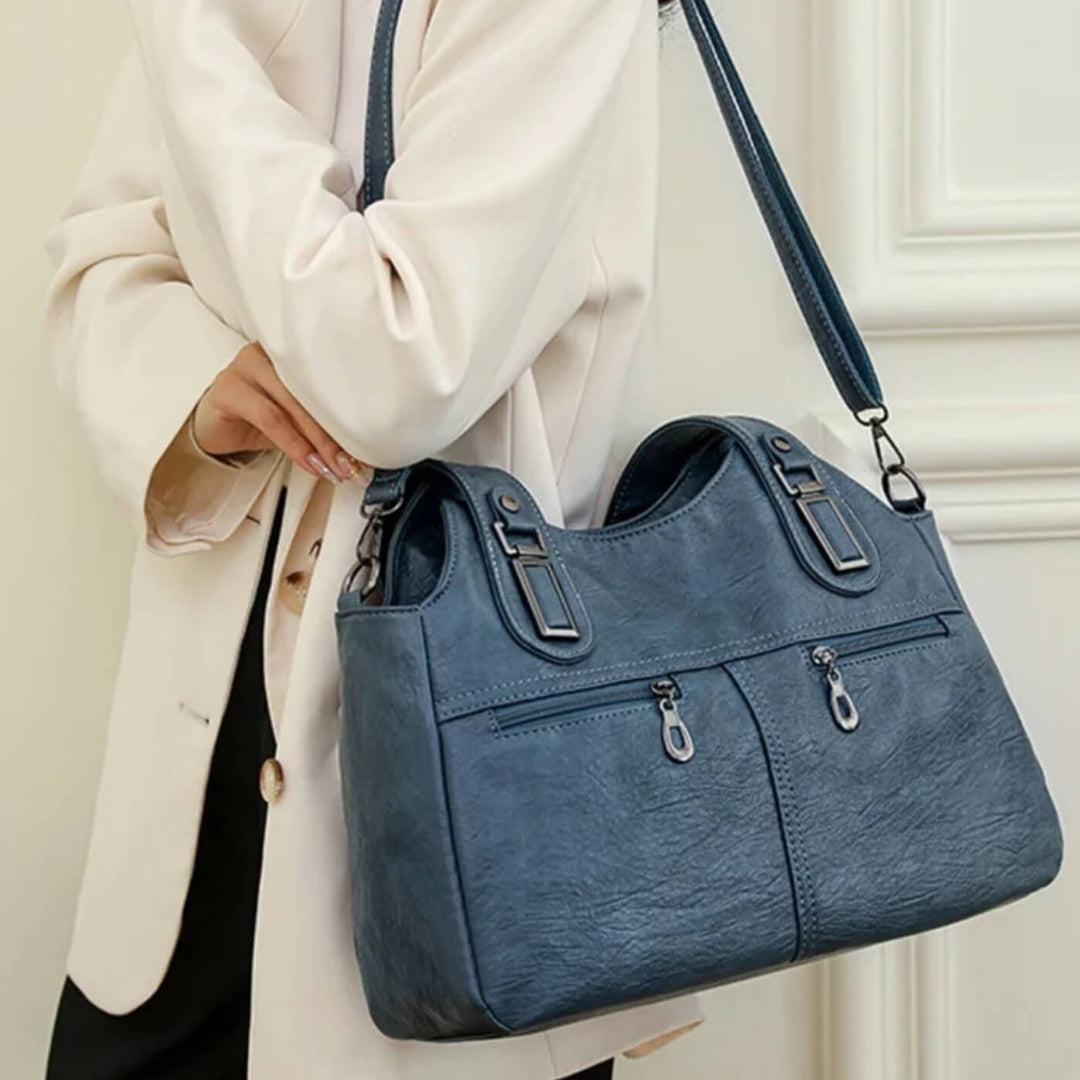 Flavia Schultertasche mit Doppelreißverschluss